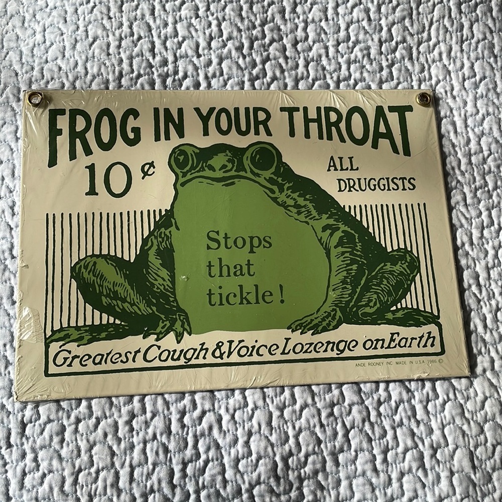 Andre Rooney porcelain advertising sign